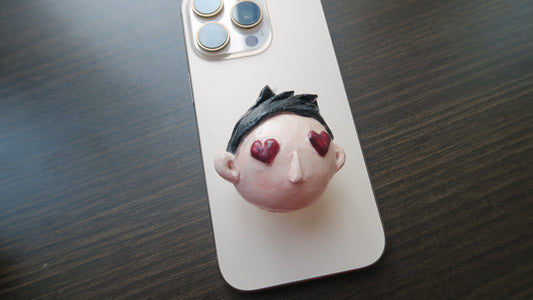 Hopeless romantic - Clay head phone grip